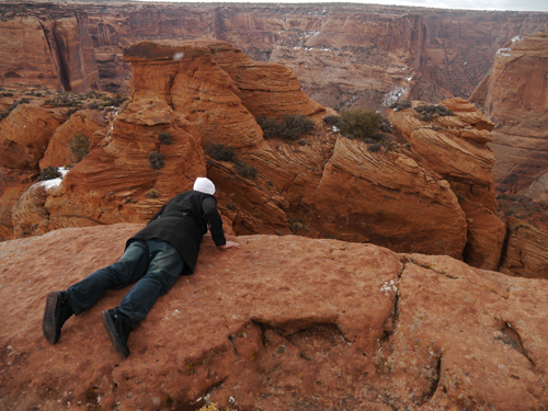 Ben looking over the edge in Canyon de Chelly